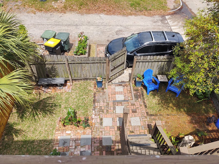 Overhead View of courtyard, entry gate and off-street parking space
