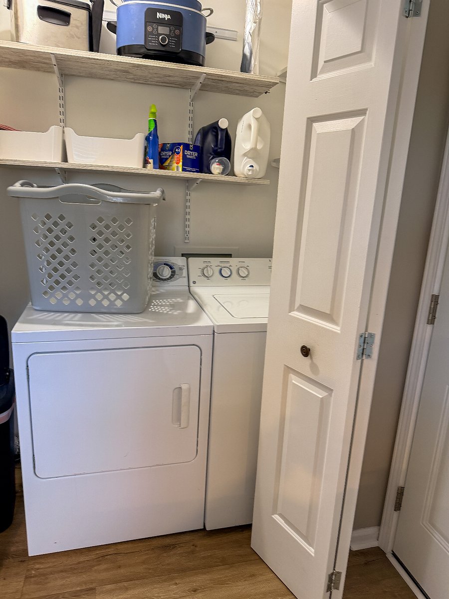 Washer and dryer in kitchen closet area