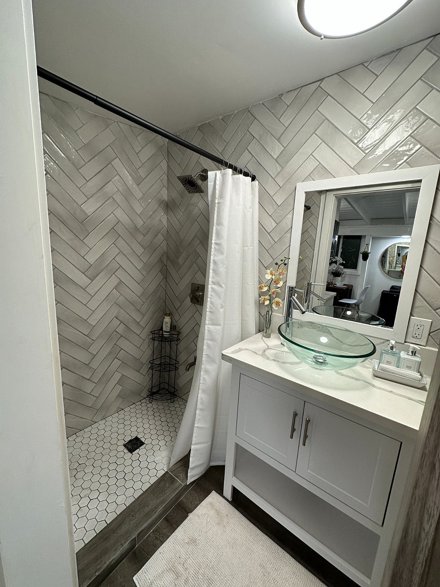 STUDIO (UNIT C)

Private bathroom with modern shower and vanity plus toilet.