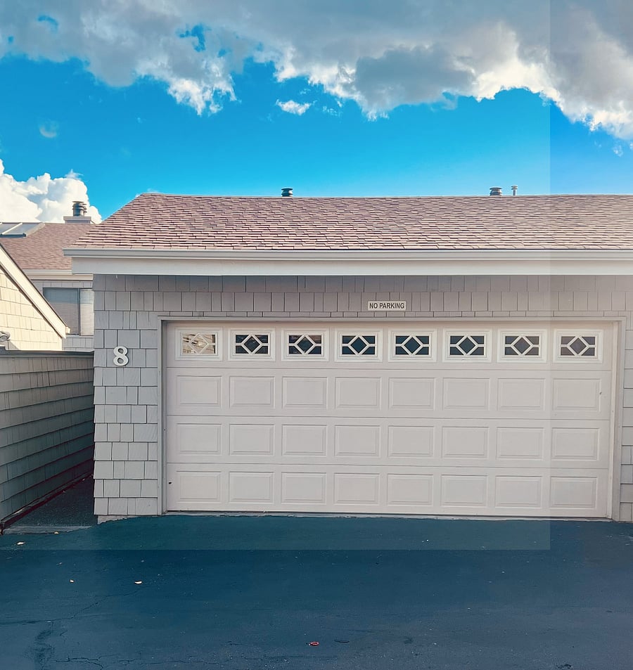 Extra large 2 car garage with storage and remote
