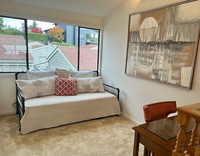 Alcove space with twin trundle beds and additional desk/office space