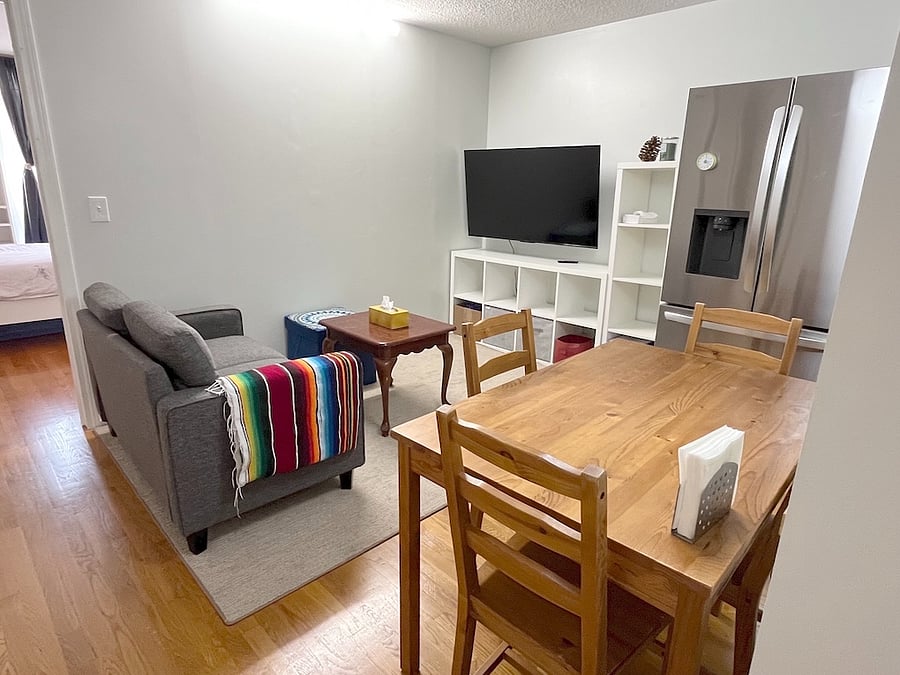 Dining/living area w/ 55in smart TV
