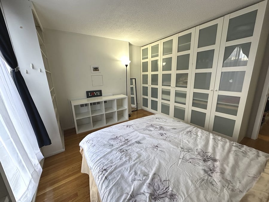 Bedroom 1 with floor-to-ceiling wardrobe