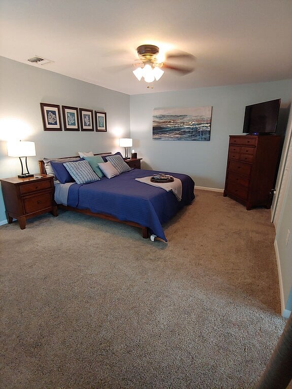Master bedroom, king with two dressers and a walk in closet