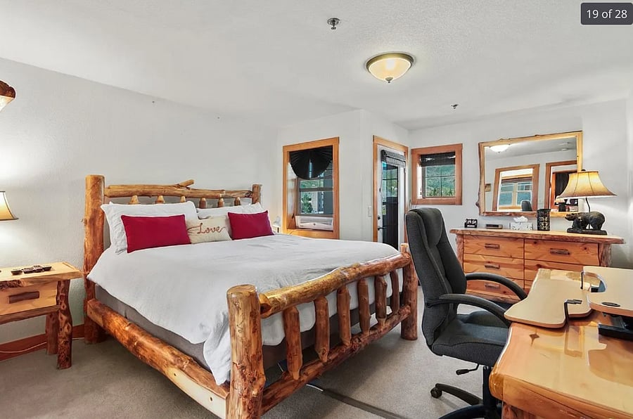 Master bed (upstairs) with desk and ensuite.