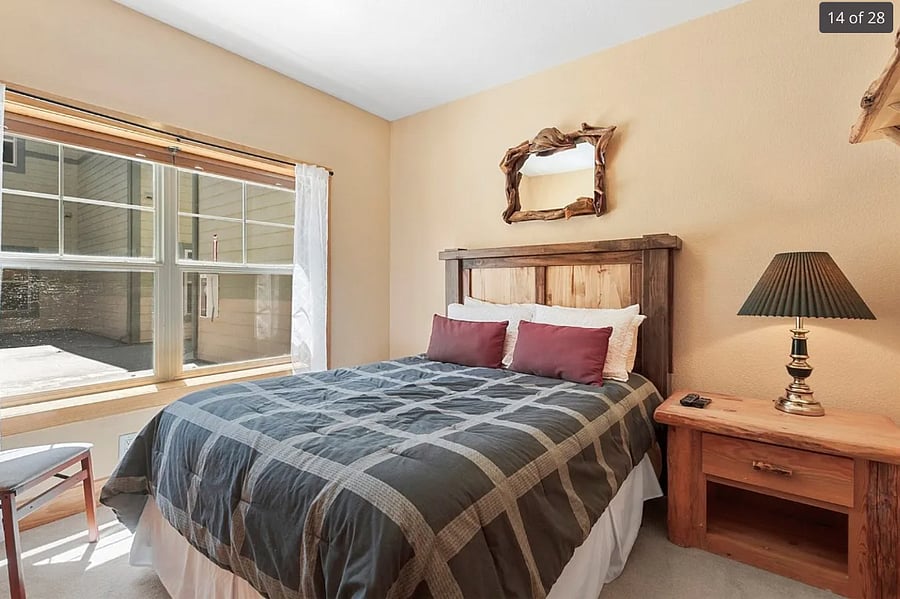 Downstairs bedroom with queen bed.