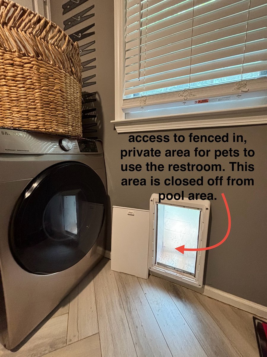 Notes for your furry friends - this doggy door is located in the laundry room. 