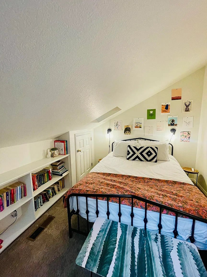Bedroom #2: Fun loft-style bedroom tucked-away upstairs with a queen sized, blackout curtains & an en suite bathroom, perfect for quiet nights & peaceful mornings.