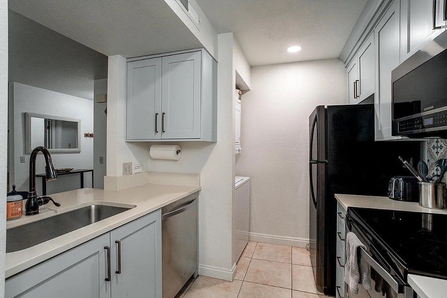 Modern appliances & newly renovated cabinets & drawers offer a clean & functional kitchen. Offerings include: toaster, blender, water pitcher, ice trays, all seasonings & oils.