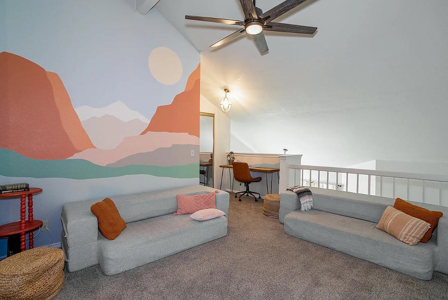 Spacious upstairs loft with two full-size futon couches that fold out into 2 queen sized beds- perfect for guests or movie nights. An additional folded up twin bed is located in the closet.
