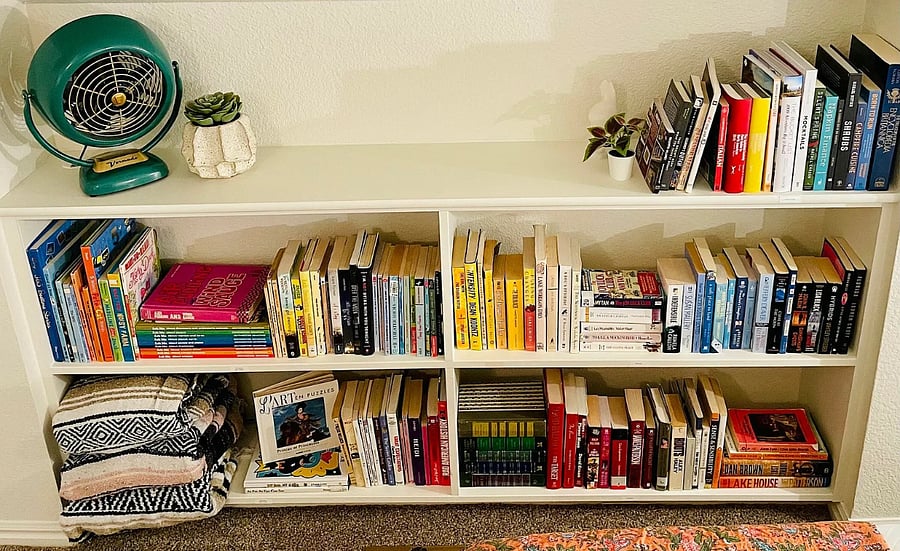 readers retreat- shelves of books and a comfortable queen bed. Items can be removed if you prefer more space for personal belongings. 
