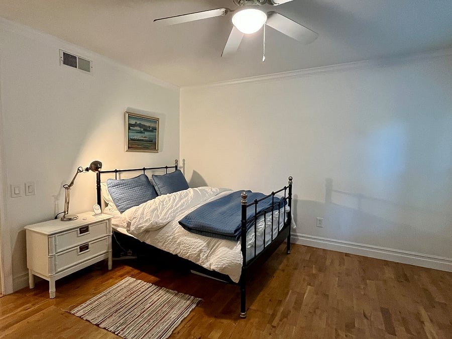 Second bedroom has desk, closet and drawers.