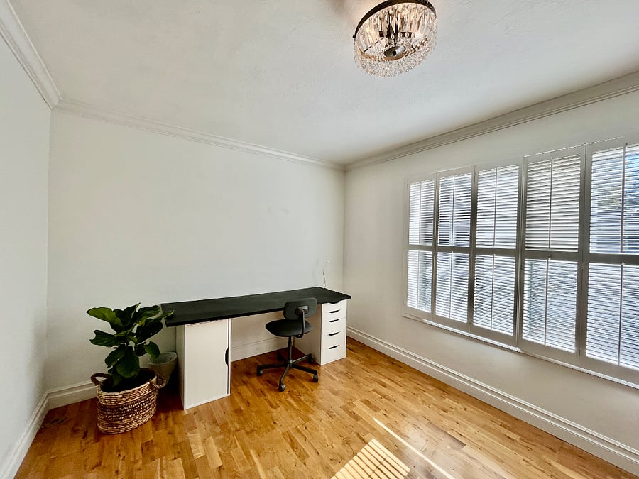 Large upstairs office in master with view to courtyard.