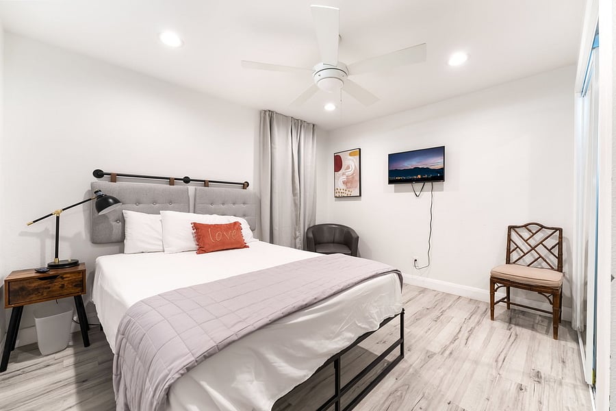 Bedroom 2 with a queen bed and smart tv