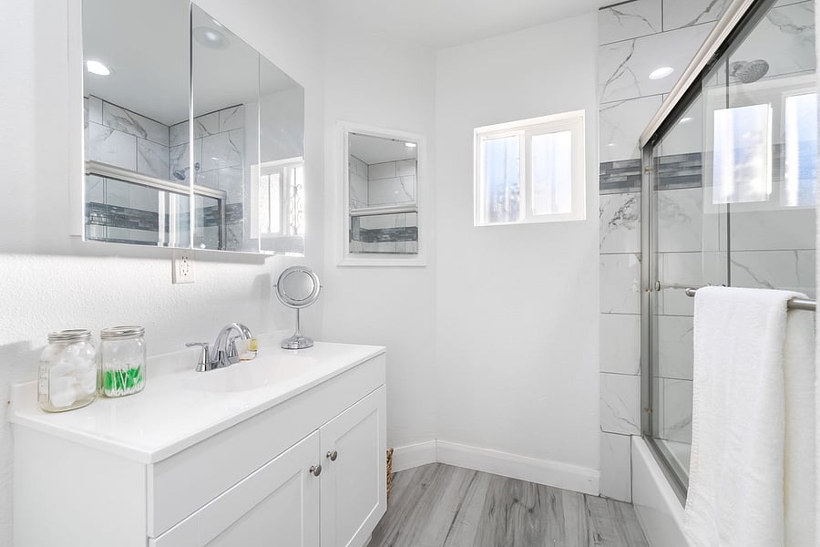 Bathroom 2 with shower/tub combo stocked with toiletries