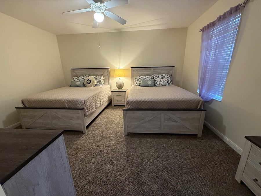 2nd floor bedroom #2.  It has 2 queen size beds, a full bathroom and a walk in closet. 