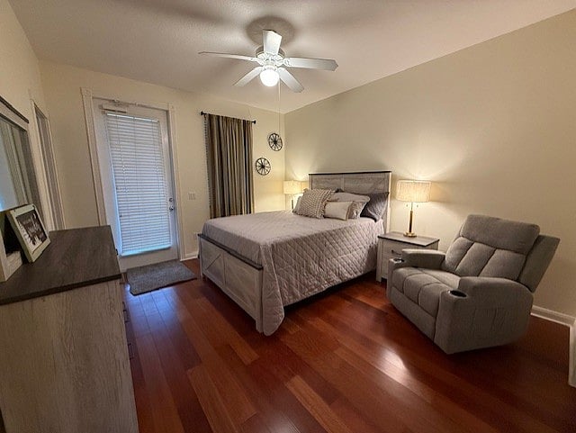 1st Floor Bedroom with a walk in closet, access to the bathroom and a door out to a patio overlooking a pond