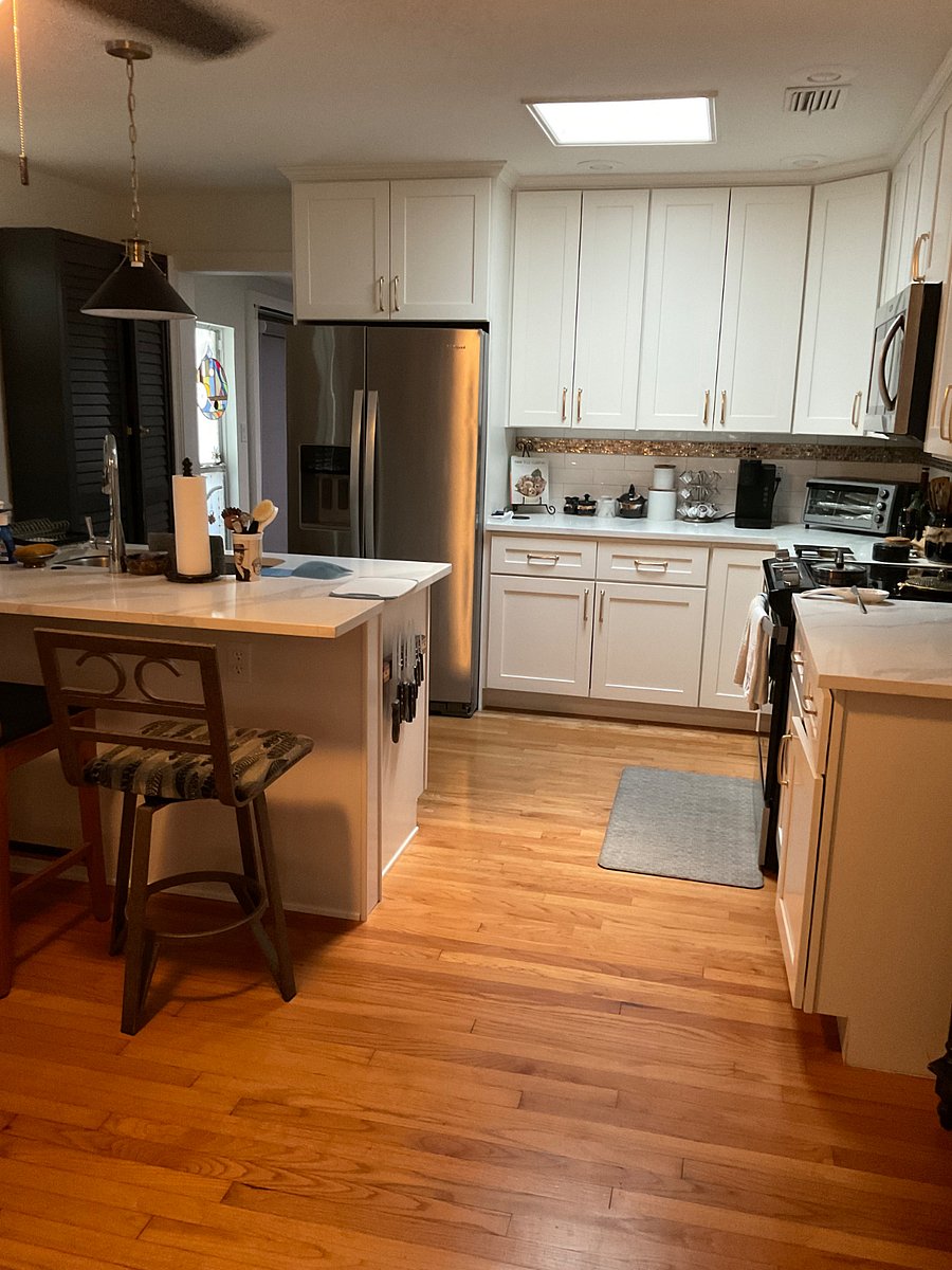 Modern Kitchen with dishwasher. Although kitchen is shared you have your own full sized refrigerator. Full set of pots pans, air fryer, microwave