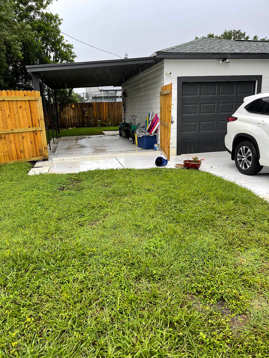 covered carport with lock for tenant vehicle. Garage is for owners car but other storage for bikes and miscellaneous items. Location of washer and dryer for tenant and owner use.
