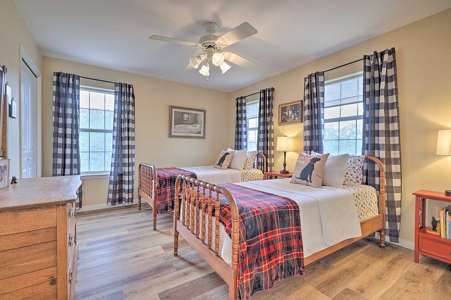 Secondary room with "dog" theme and two twin beds. Overlooks front and side yard.