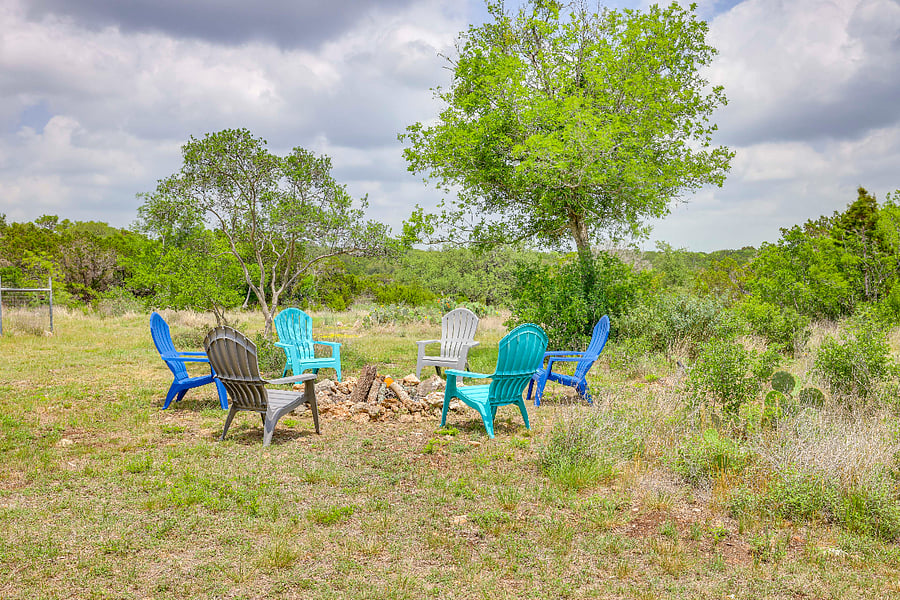 Backyard with view of firepit and the rest of the heavily treed 6 acres.