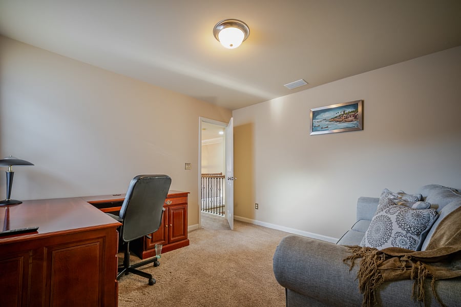 Bedroom 5/Office with L-shaped desk and queen size sleeper sofa