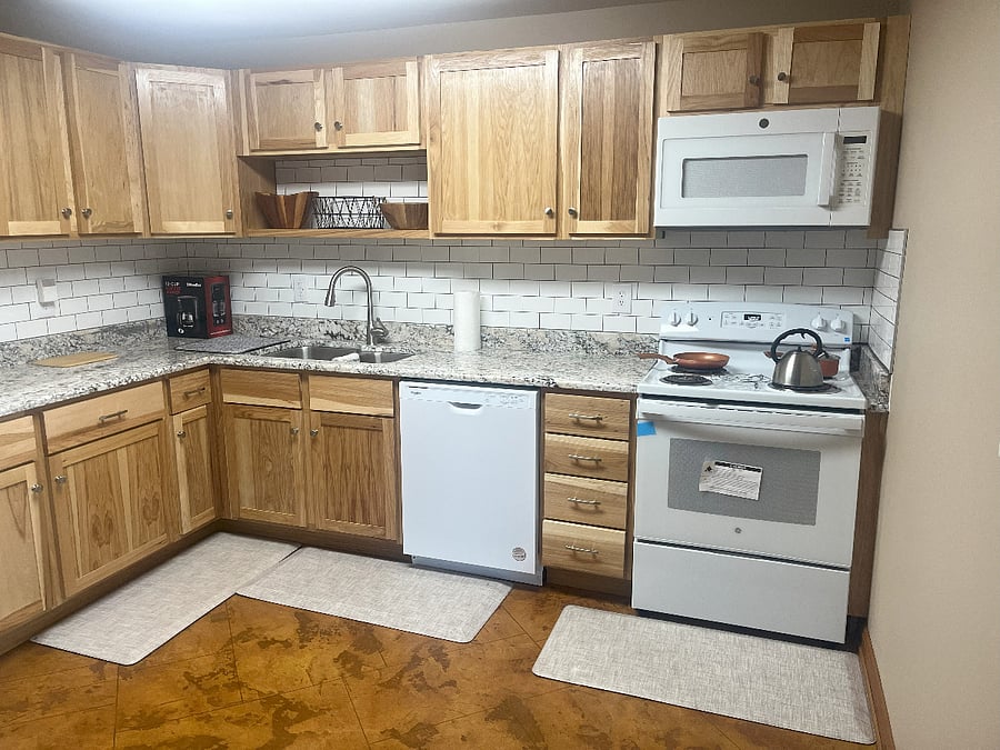 New dishwasher and range. Kitchen includes new air fryer.