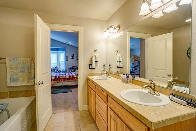 Double vanities in primary suite & ample storage