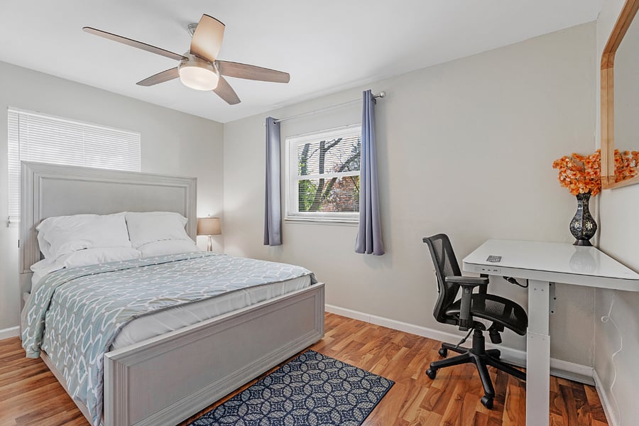 Queen Bedroom with a workspace