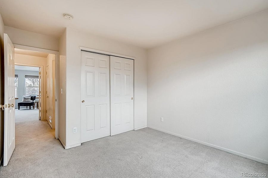 The second bedroom is upstairs. The upstairs is now wood flooring not carpet