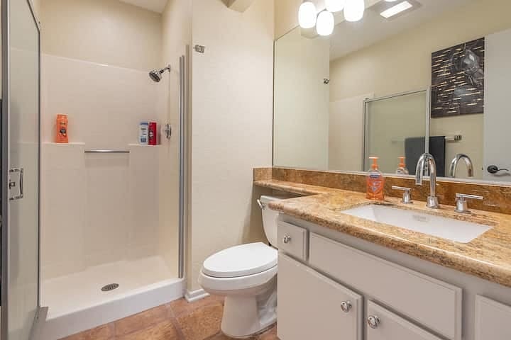 A full-sized bathroom is available downstairs next to the guest bedroom.
