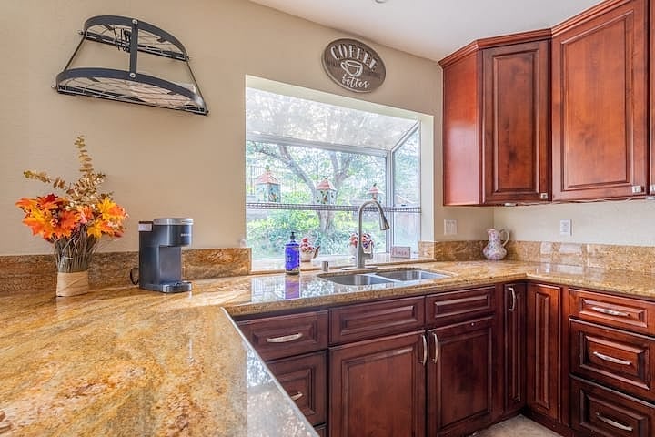 The kitchen window overlooks the spacious back yard.