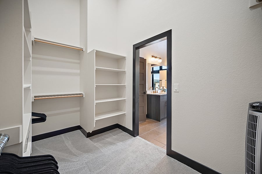+2nd Floor
+Primary Suite
+King Bed
+Walk-In Closet
+Attached Bathroom
+Desk
+Dresser
+TV