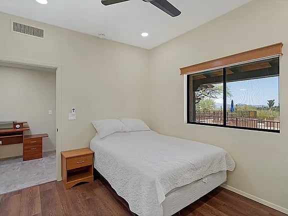 Pool facing queen bedroom