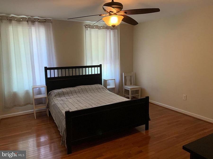 bedroom 1 shows some furniture, comes with queen size bed, 2 dressers and a desk, closet and has a ceiling fan. $850