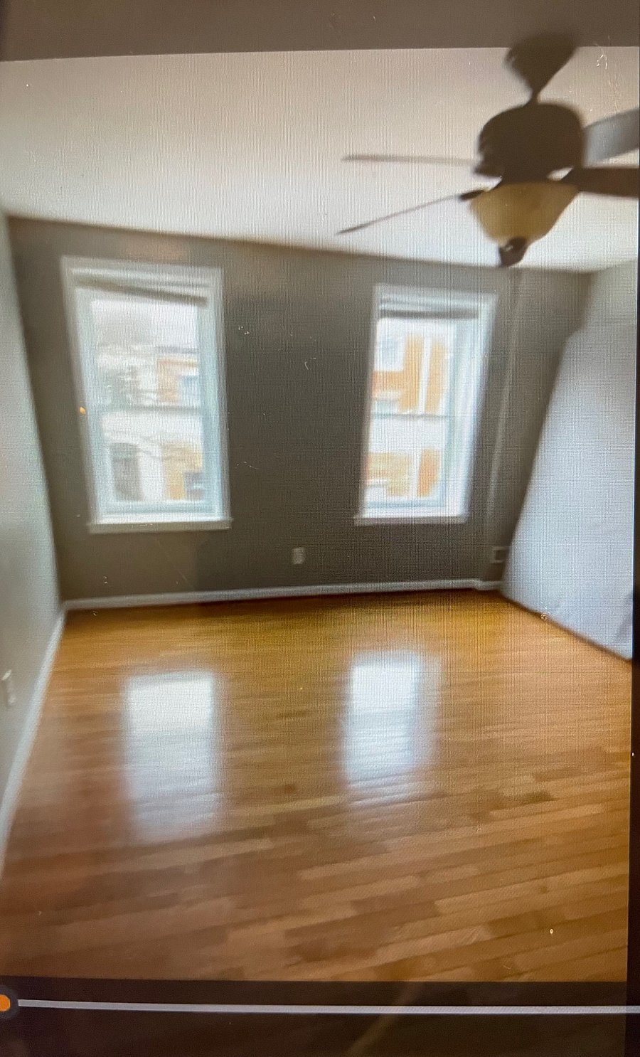 another look at what bedroom 1 looks like without furniture, great lighting comes from the windows.