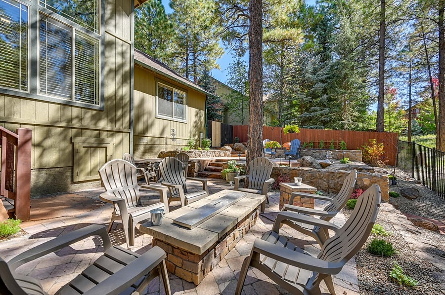 Backyard with fire table and chairs