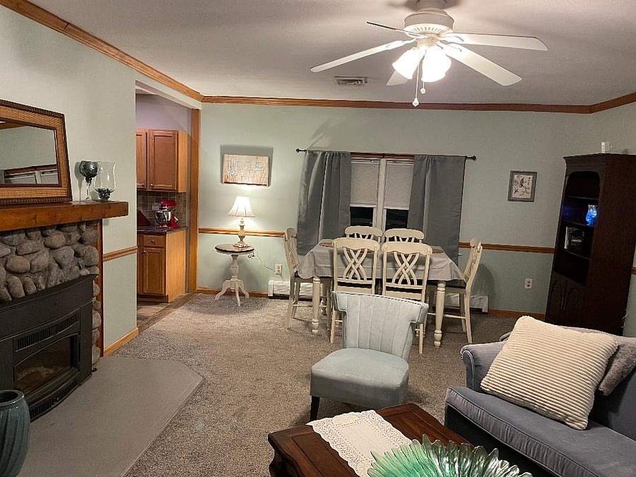 living room showing entry to galley kitchen