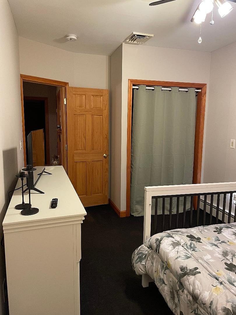 white black bedroom w closet view