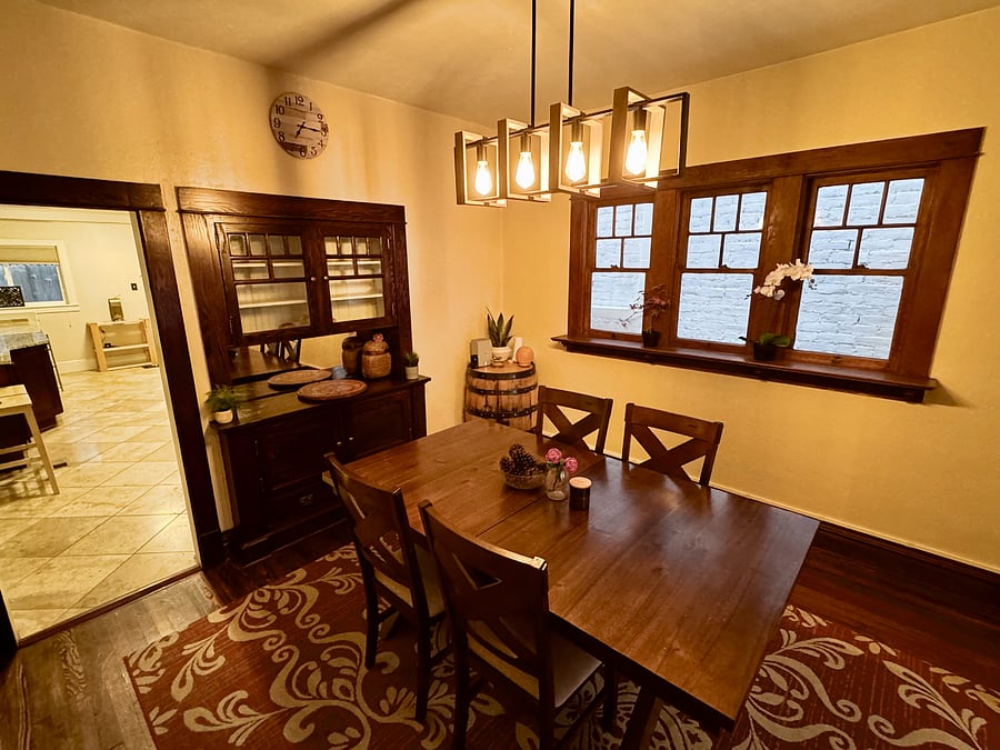 Full dining room table with expandable leaf, original wood, security system, barrel storage unit