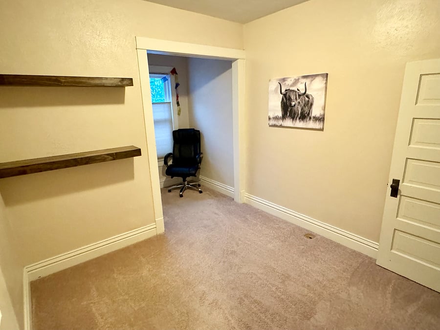 2nd bedroom with full closet system and shelving