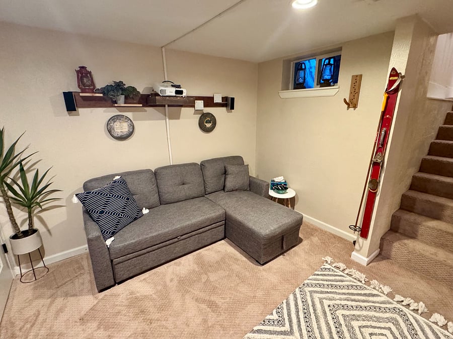 Full pullout bed w/ 4" memory foam and sheets for 2nd bed downstairs. Movie theater with projector, screen, and surround sound w/ Apple TV unit. 