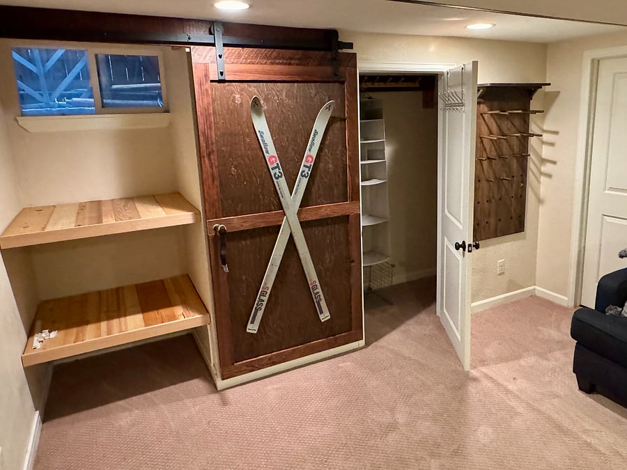 3 closets and gear closet with barn door 