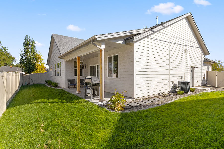 Fully fenced backyard for your furry friend. Also, enjoy the BBQ and relaxing patio furniture.
