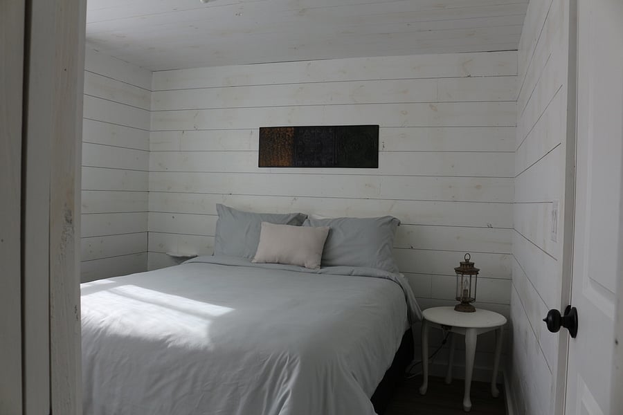 Downstairs bedroom has a Queen Bed.