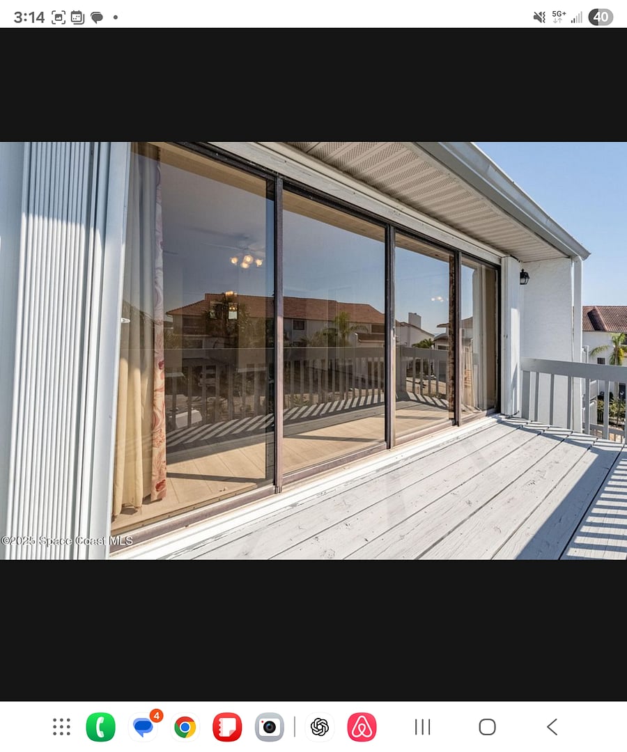 Balcony off the main master bedroom. Wall of Windows - Sliding Door.