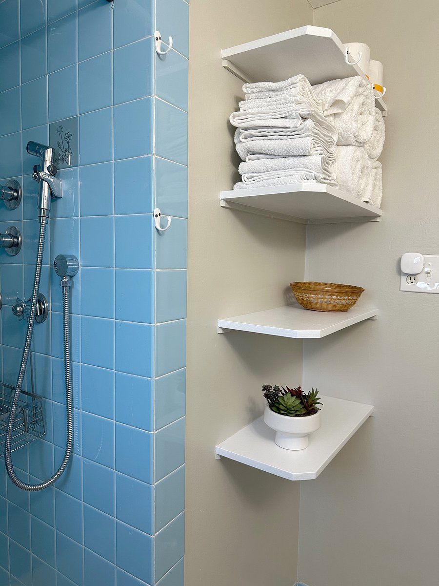 Ha, ha... more shelves in the bathroom!