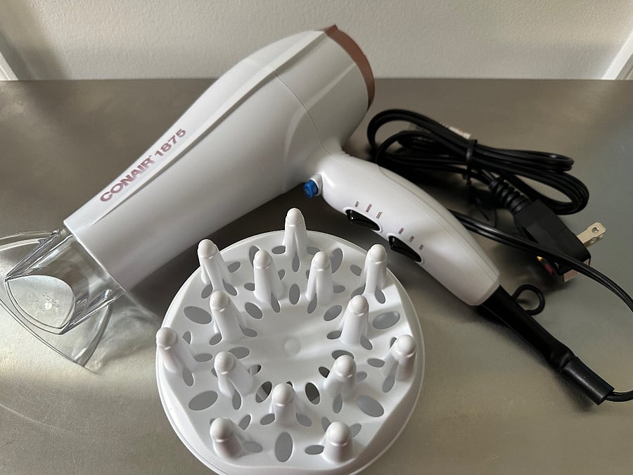 Hair Dryer with difussing attachment.