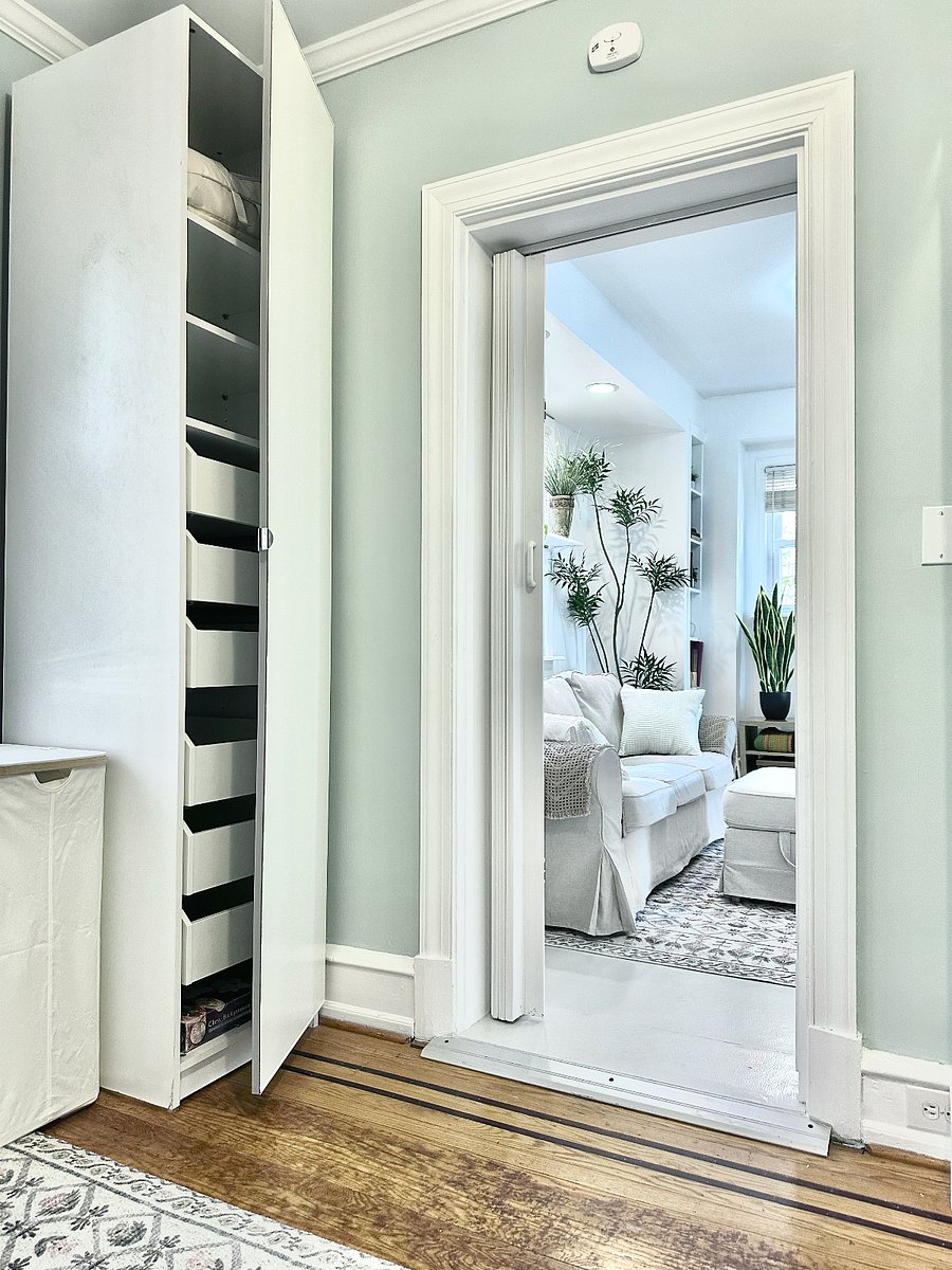 On the left side of this photo is tall chest of sliding drawers, so you don't have to live out of your suitcase!