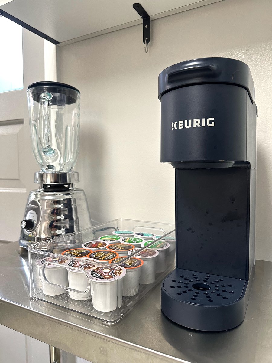 Keurig coffee maker, and an initial welcome supply of coffee inserts.